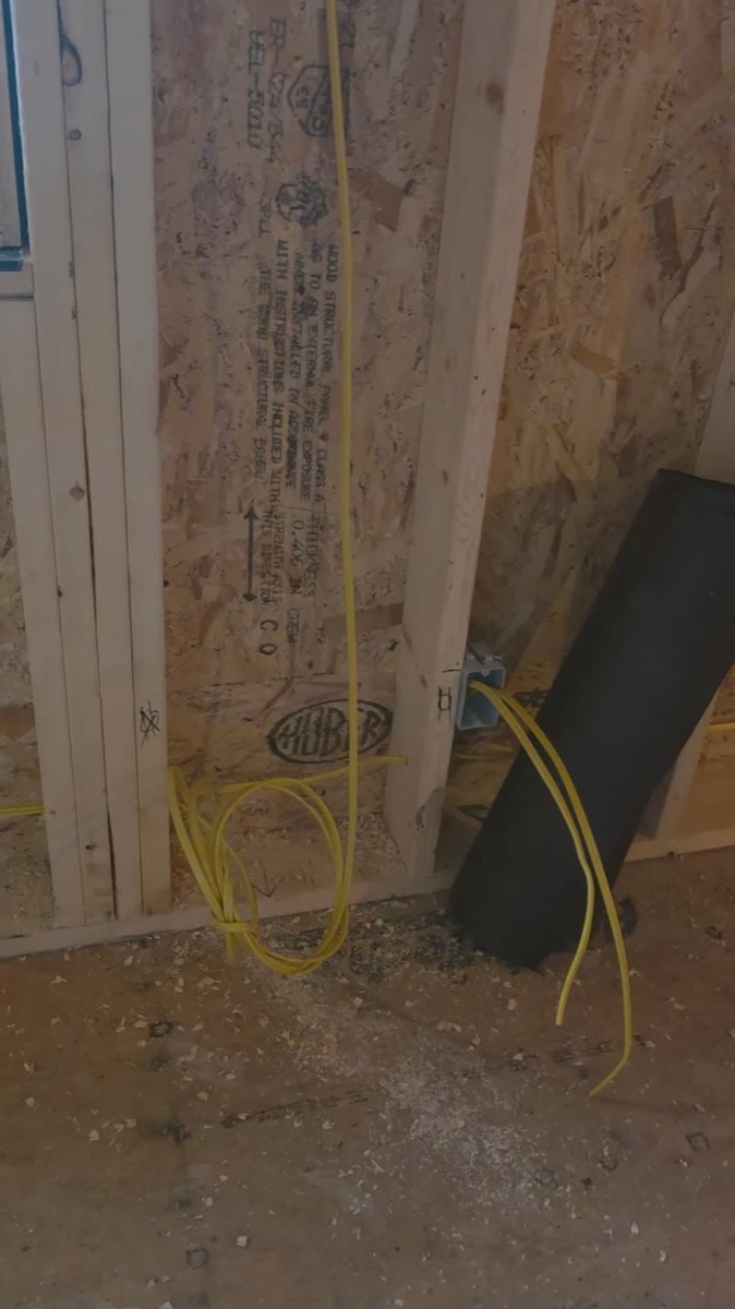 Whole-house rough-in: home runs pulled and boxes set on the framing